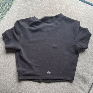 ALO Yoga Women’s Black Short Sleeve Crop Tee (back shown)
